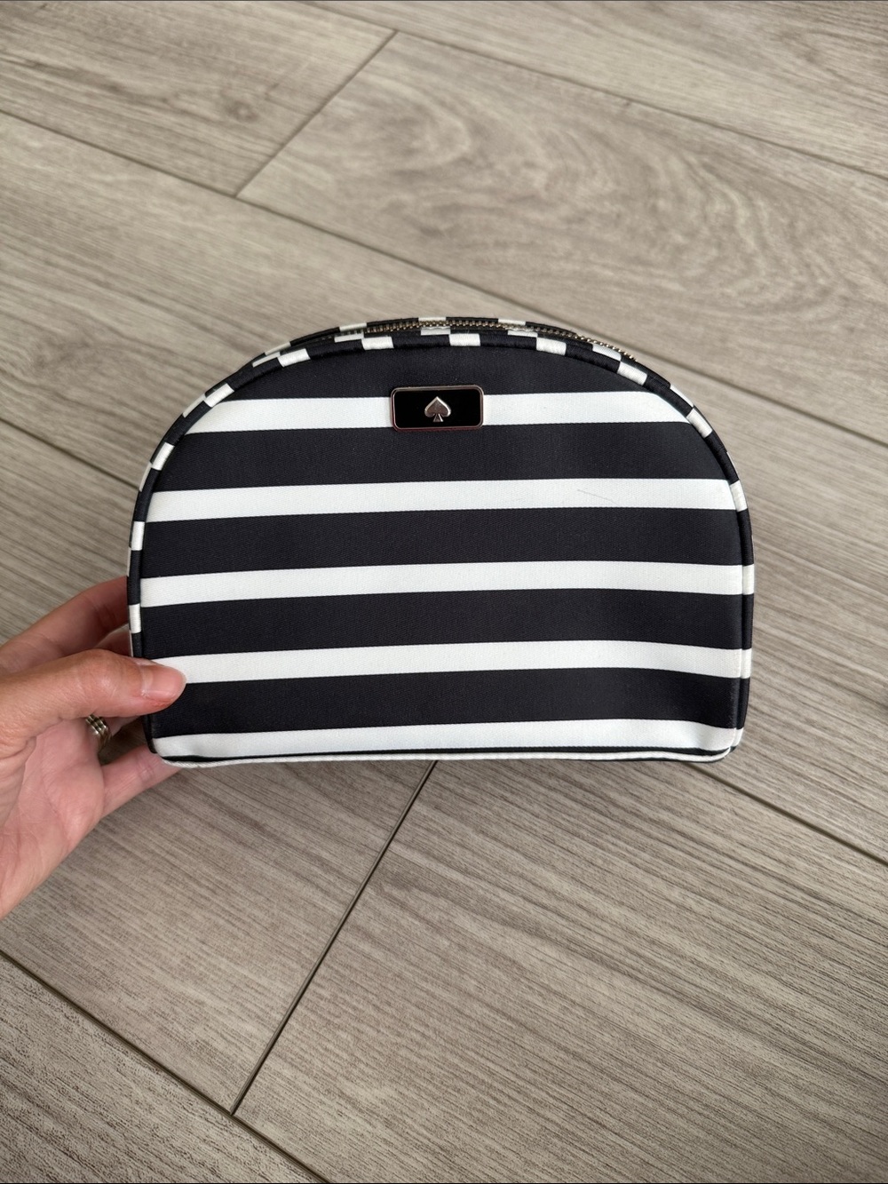 Kate Spade New York medium dome cosmetic bag black and white stripes